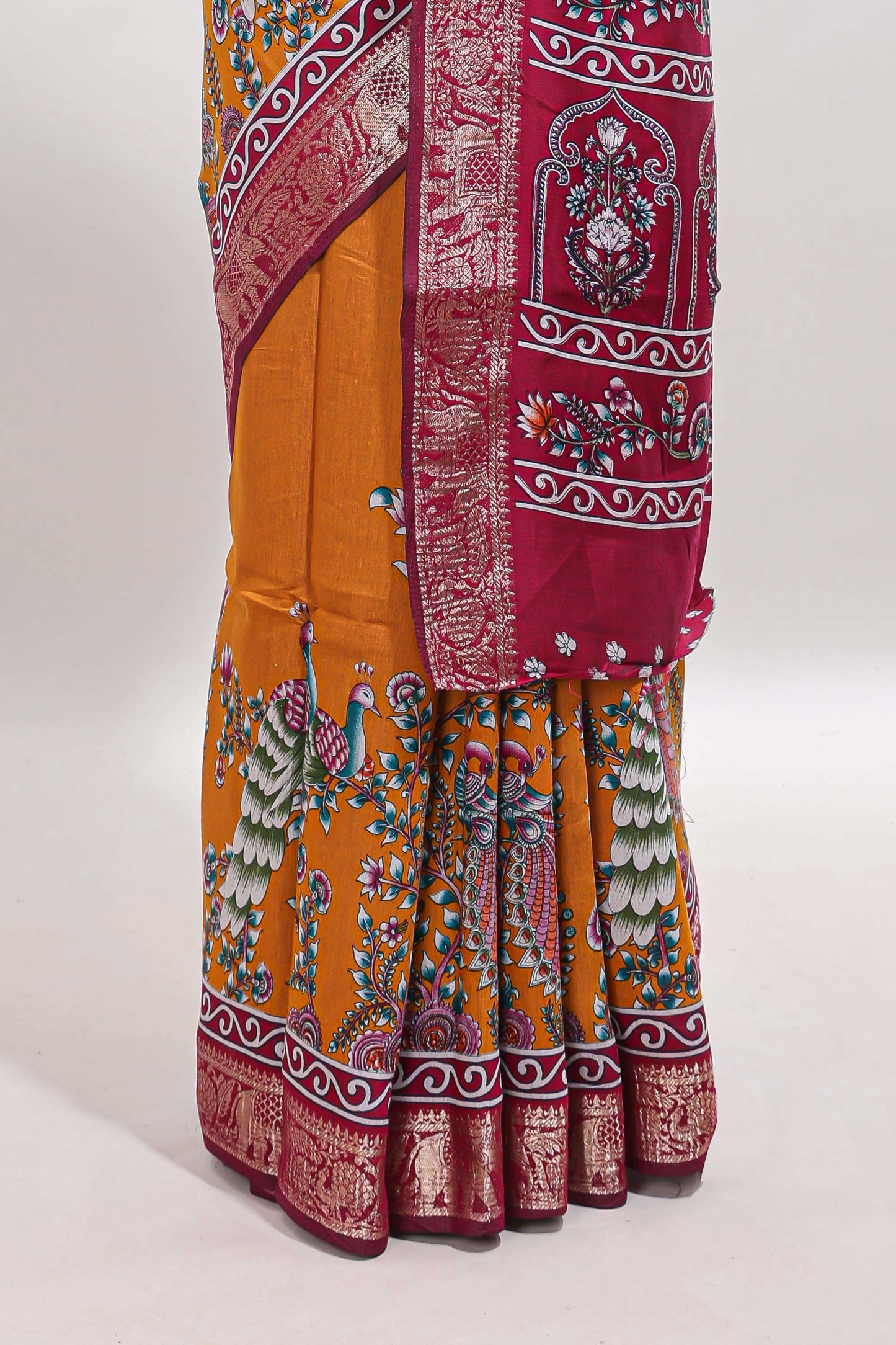 Mustard peacock & floral design marsh mellow saree with contrast border and printed blouse