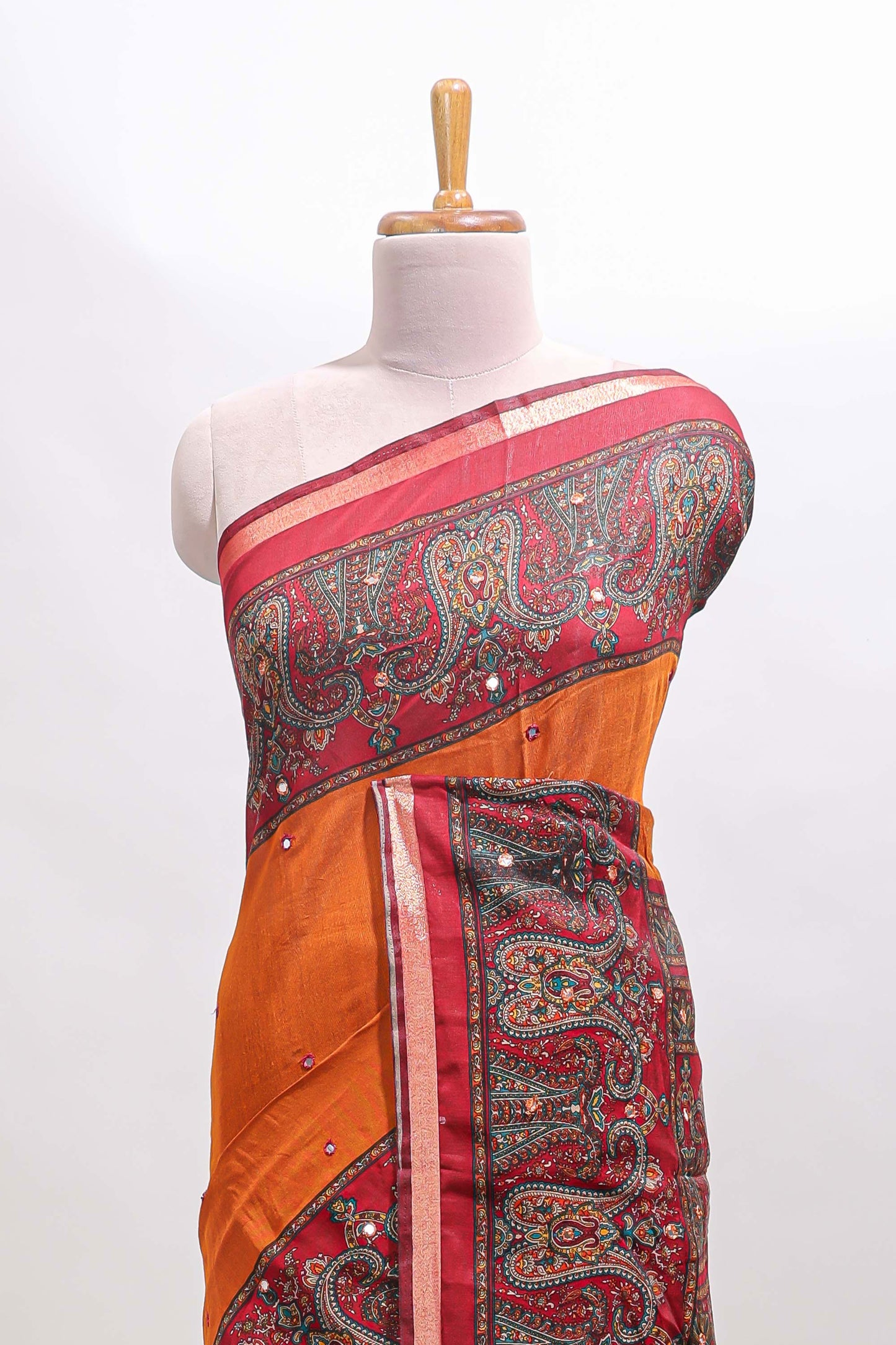Orange mirror work embroidery design marsh mellow saree with contrast border and printed blouse