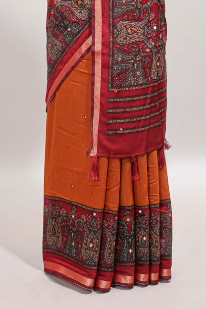 Orange mirror work embroidery design marsh mellow saree with contrast border and printed blouse