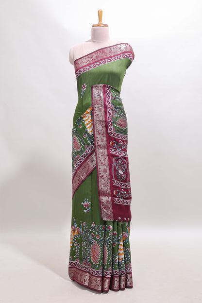 Green peacock & floral design marsh mellow saree with contrast border and printed blouse