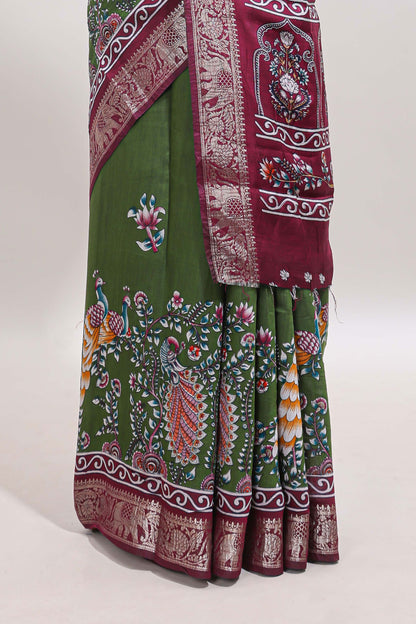 Green peacock & floral design marsh mellow saree with contrast border and printed blouse