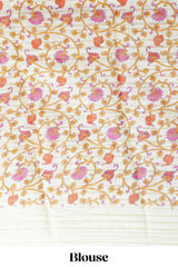 Orange colourshibori printed marsh mellow saree with contrast border and matching printed blouse