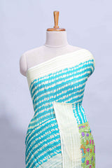 Blue colourshibori printed marsh mellow saree with contrast border and matching printed blouse