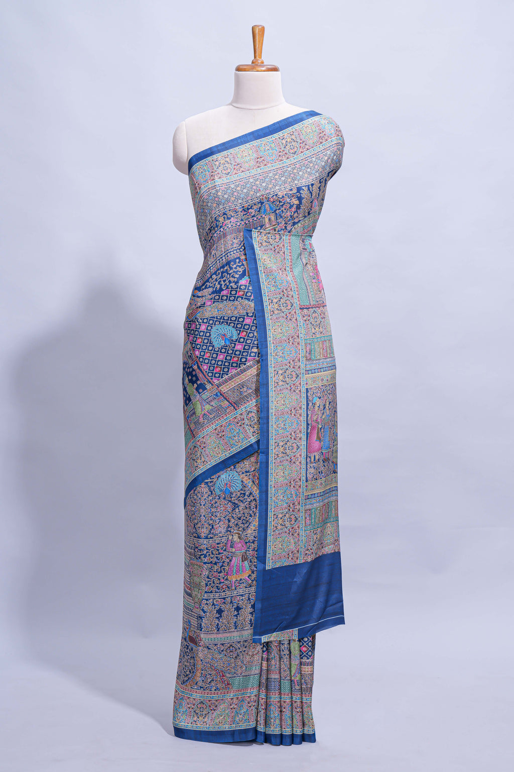 Royal blue mughal printed marsh mellow saree with self border and self printed pallu along with matching blouse