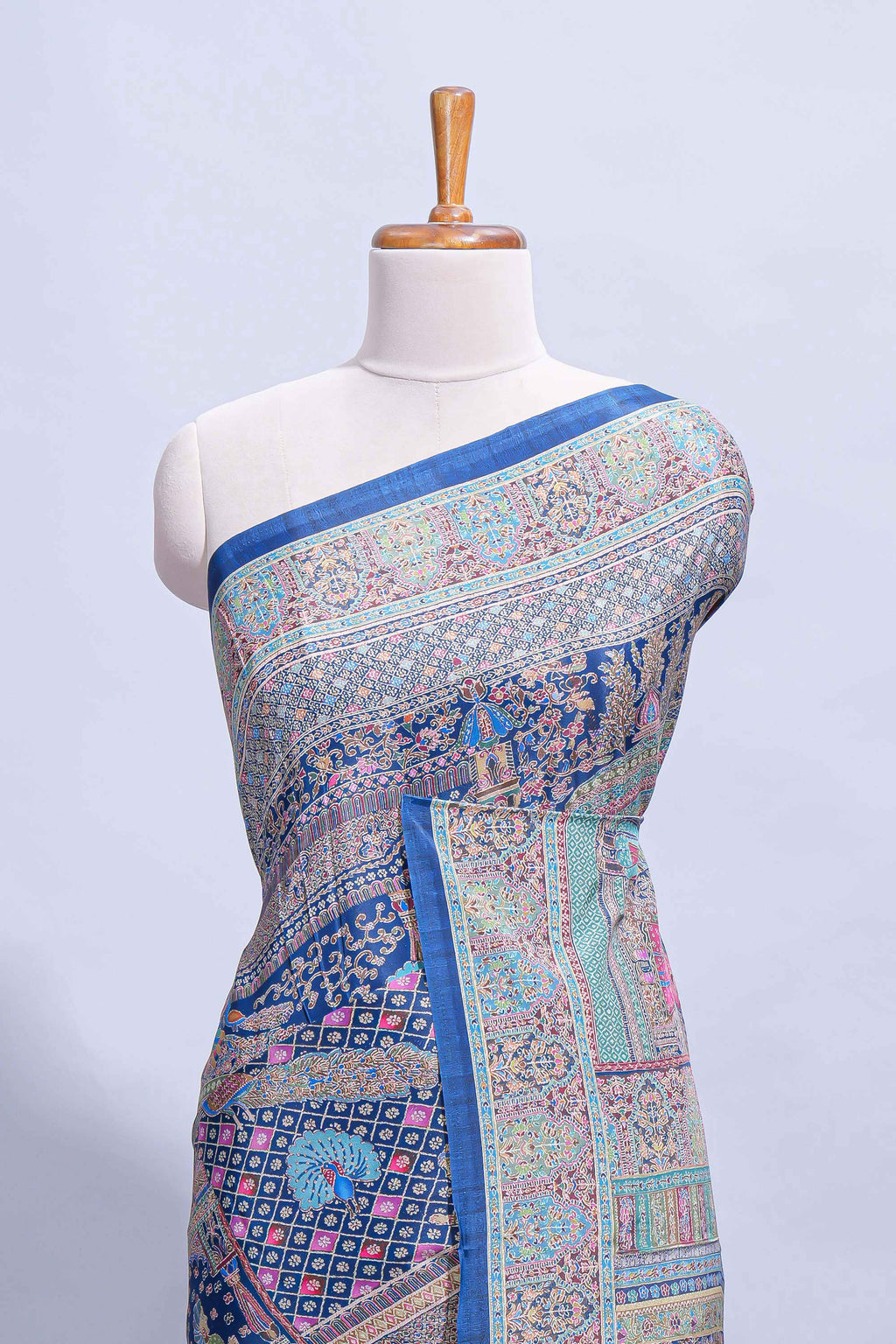 Royal blue mughal printed marsh mellow saree with self border and self printed pallu along with matching blouse