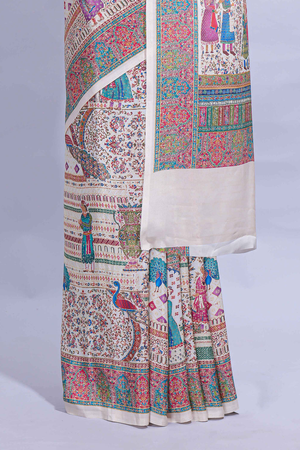 Ivory colour mughal printed marsh mellow saree with self border and self printed pallu along with matching blouse