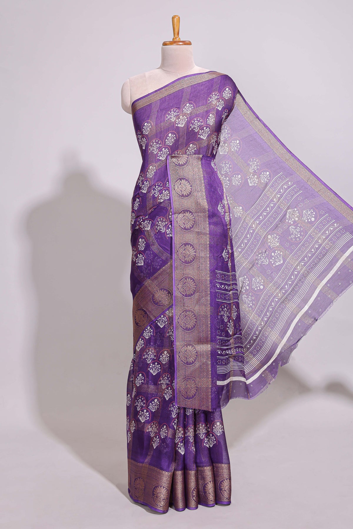 Purple checked floral design marsh mellow saree with self zari border and matching blouse