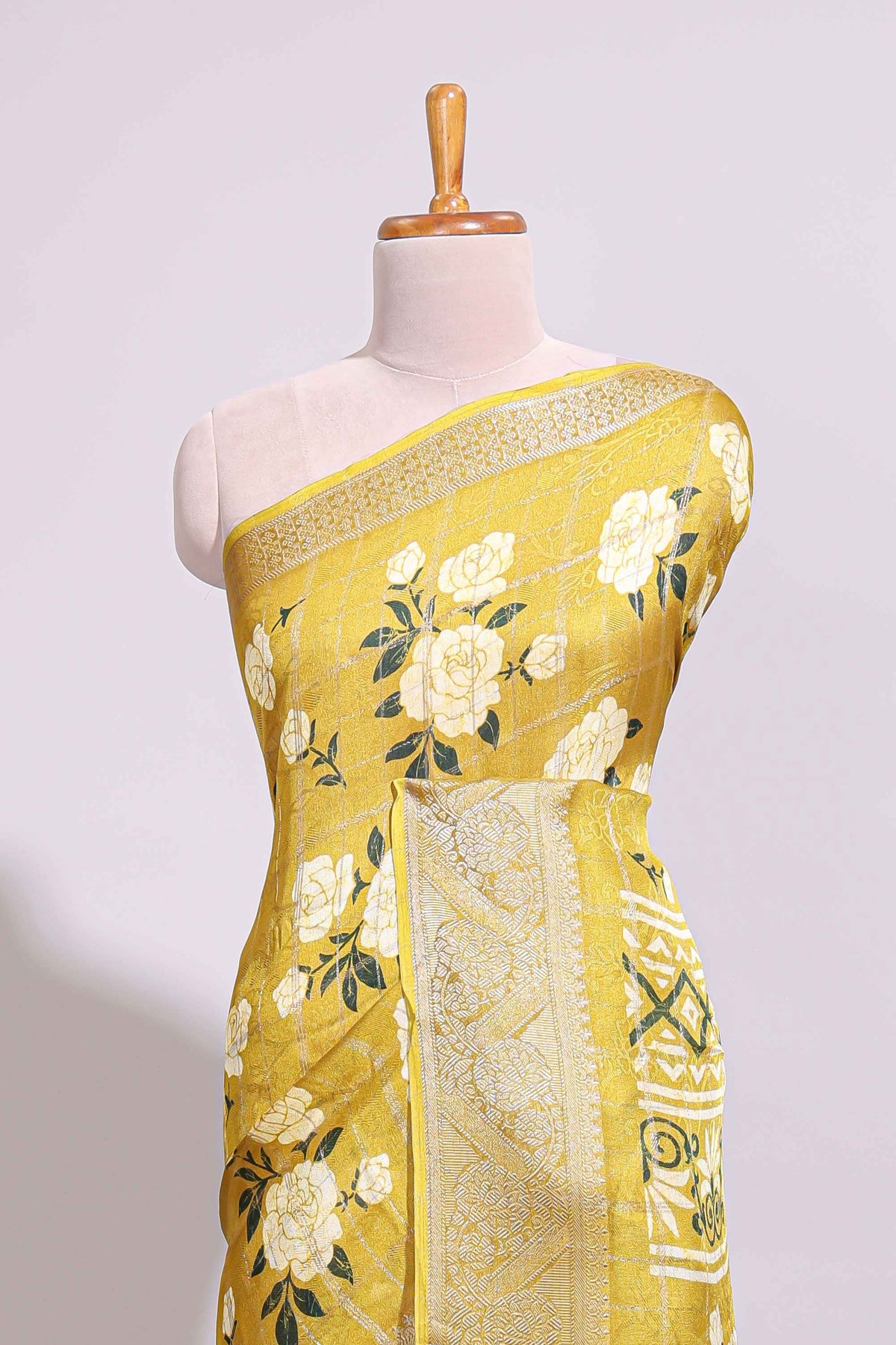 Yellow checked floral design marsh mellow saree with self zari border and matching blouse
