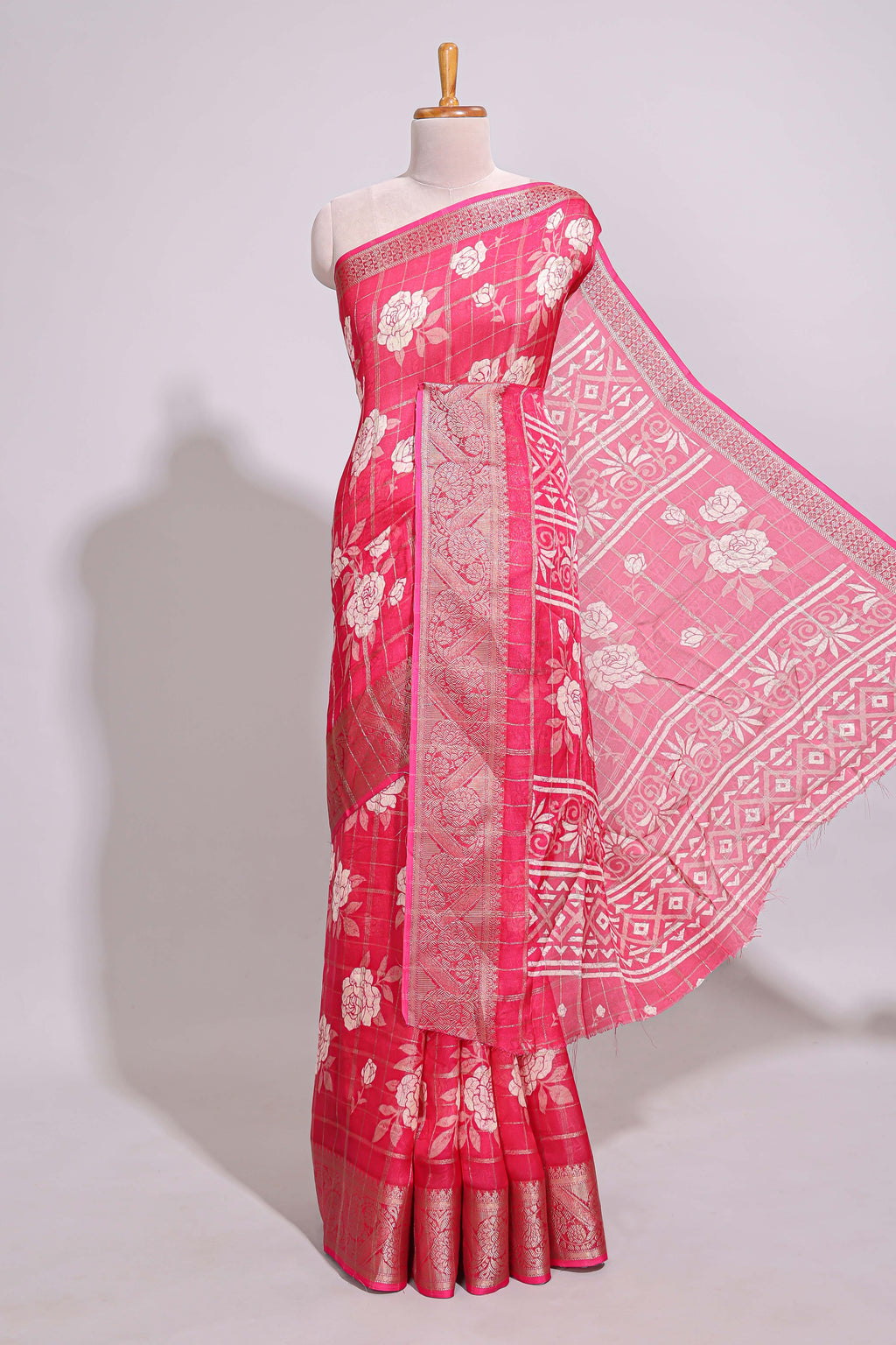 Pink checked floral design marsh mellow saree with self zari border and matching blouse
