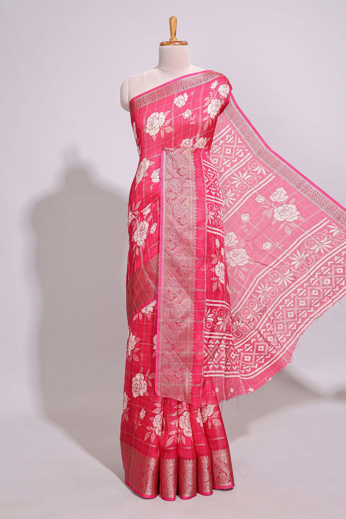 Pink checked floral design marsh mellow saree with self zari border and matching blouse