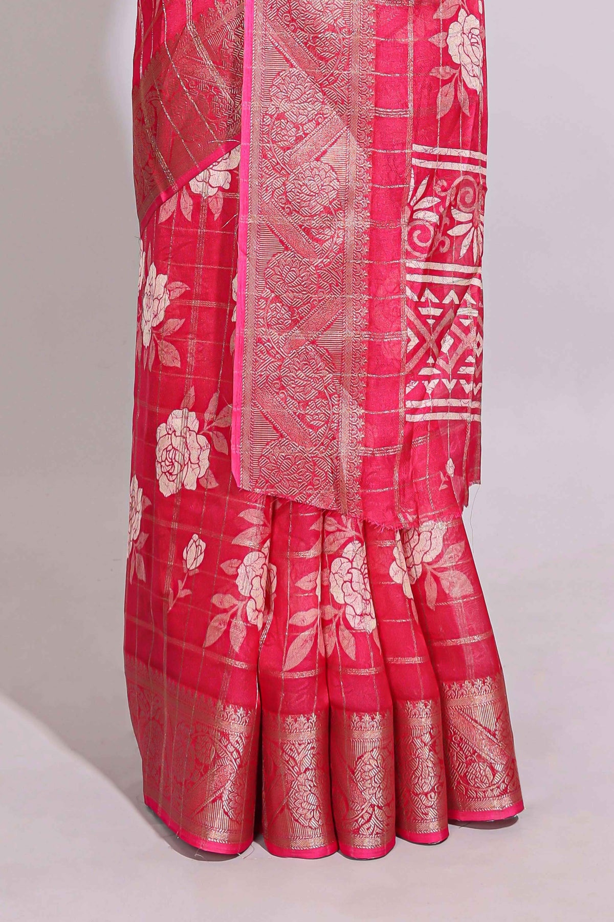 Pink checked floral design marsh mellow saree with self zari border and matching blouse