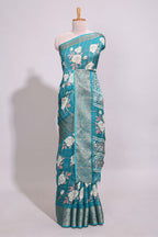 Teal green checked floral design marsh mellow saree with self zari border and matching blouse