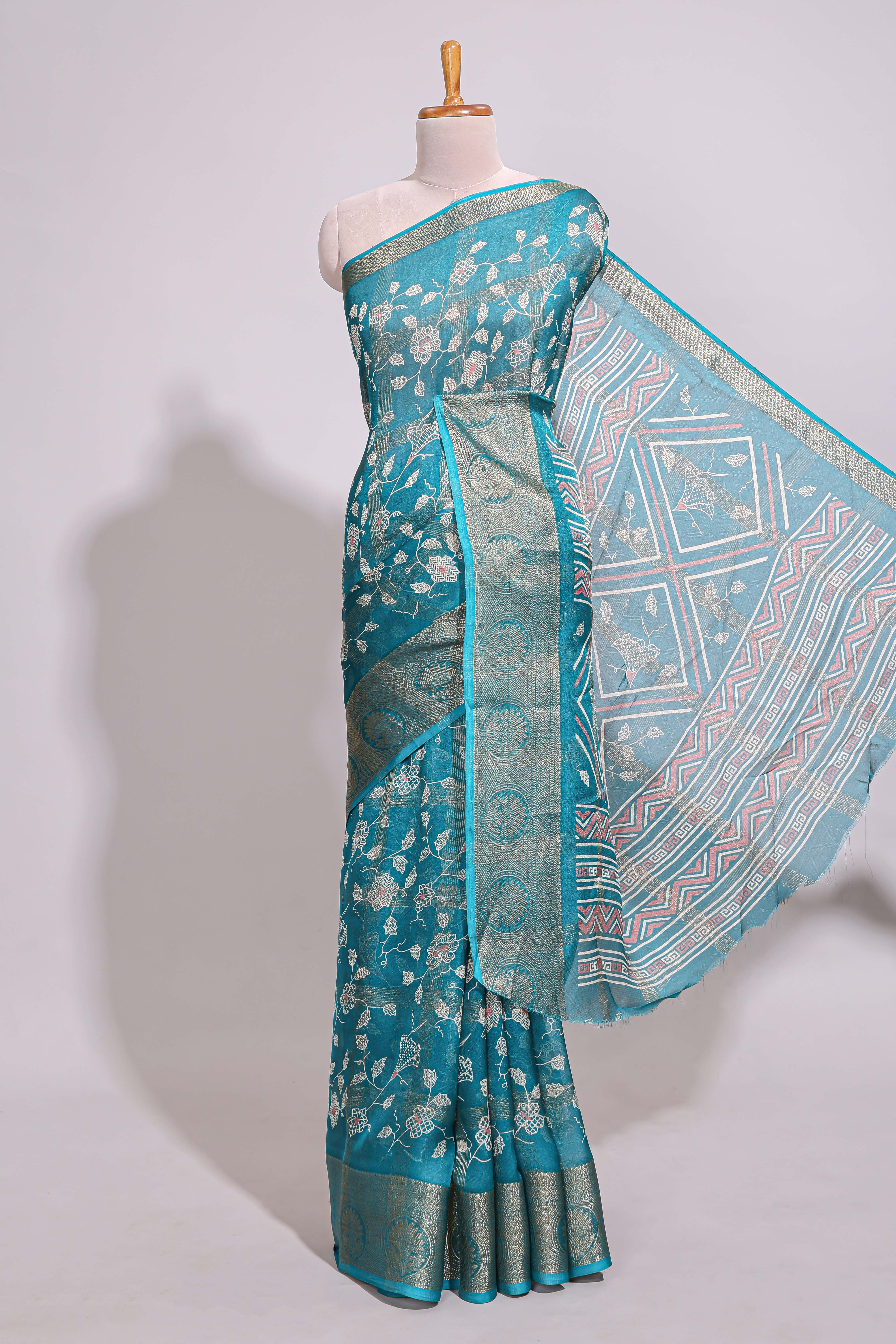 Teal green checked floral design marsh mellow saree with self zari border and matching zari blouse