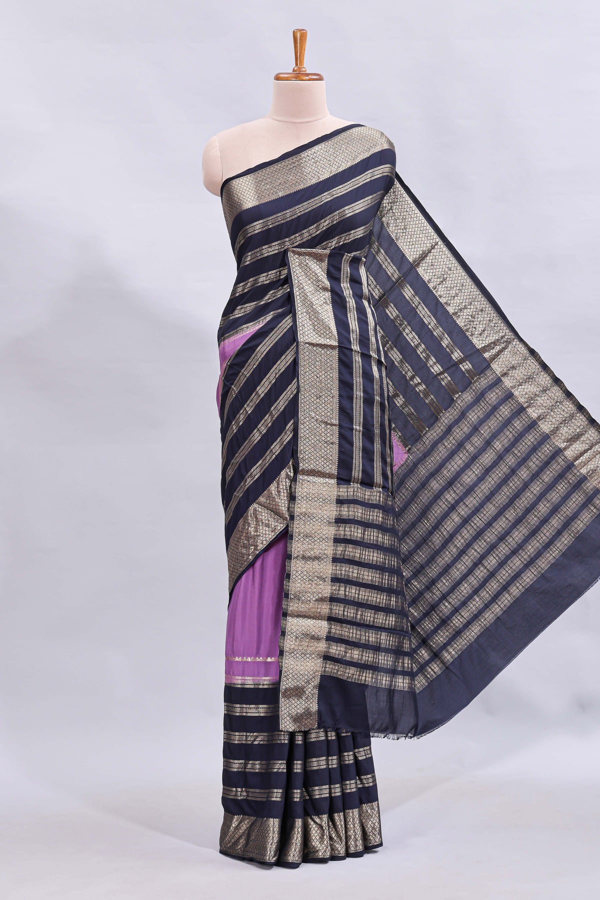 Lavender zari design mushru silk saree with contrast striped zari border and blouse