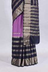 Lavender zari design mushru silk saree with contrast striped zari border and blouse