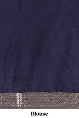 Lavender zari design mushru silk saree with contrast striped zari border and blouse