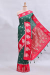 Green floral design motifs mushru silk saree with contrast border and blouse
