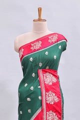Green floral design motifs mushru silk saree with contrast border and blouse