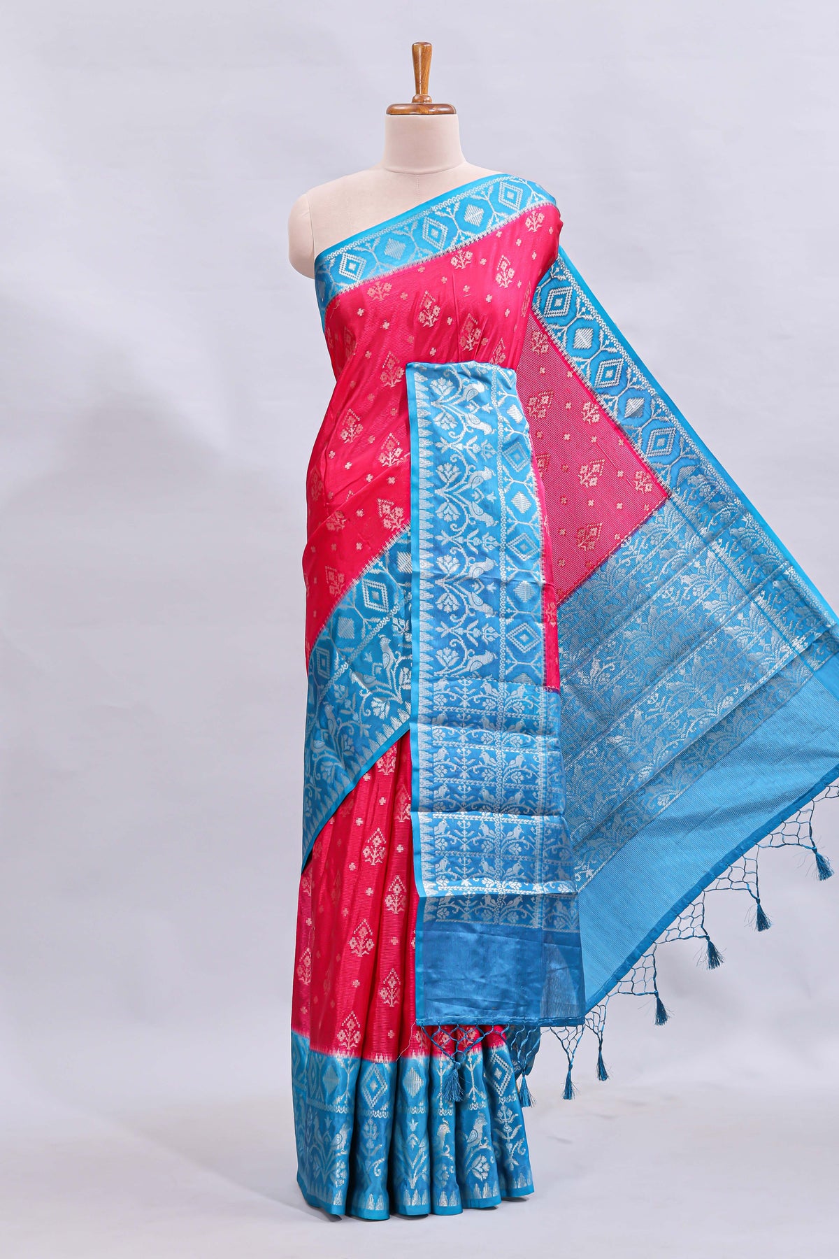 Pink floral design mushru silk saree with contrast border and zari blouse