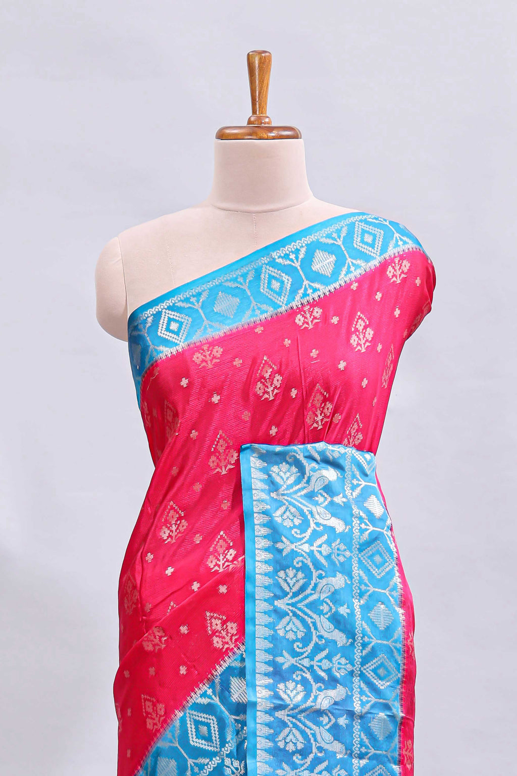 Pink floral design mushru silk saree with contrast border and zari blouse