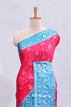 Pink floral design mushru silk saree with contrast border and zari blouse