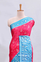 Pink floral design mushru silk saree with contrast border and zari blouse