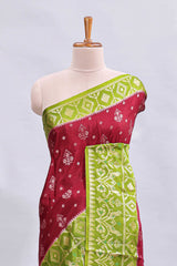 Maroon floral design mushru silk saree with contrast border and zari blouse