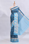 Blue checked floral motifs design mushru silk saree with contrast border and blouse