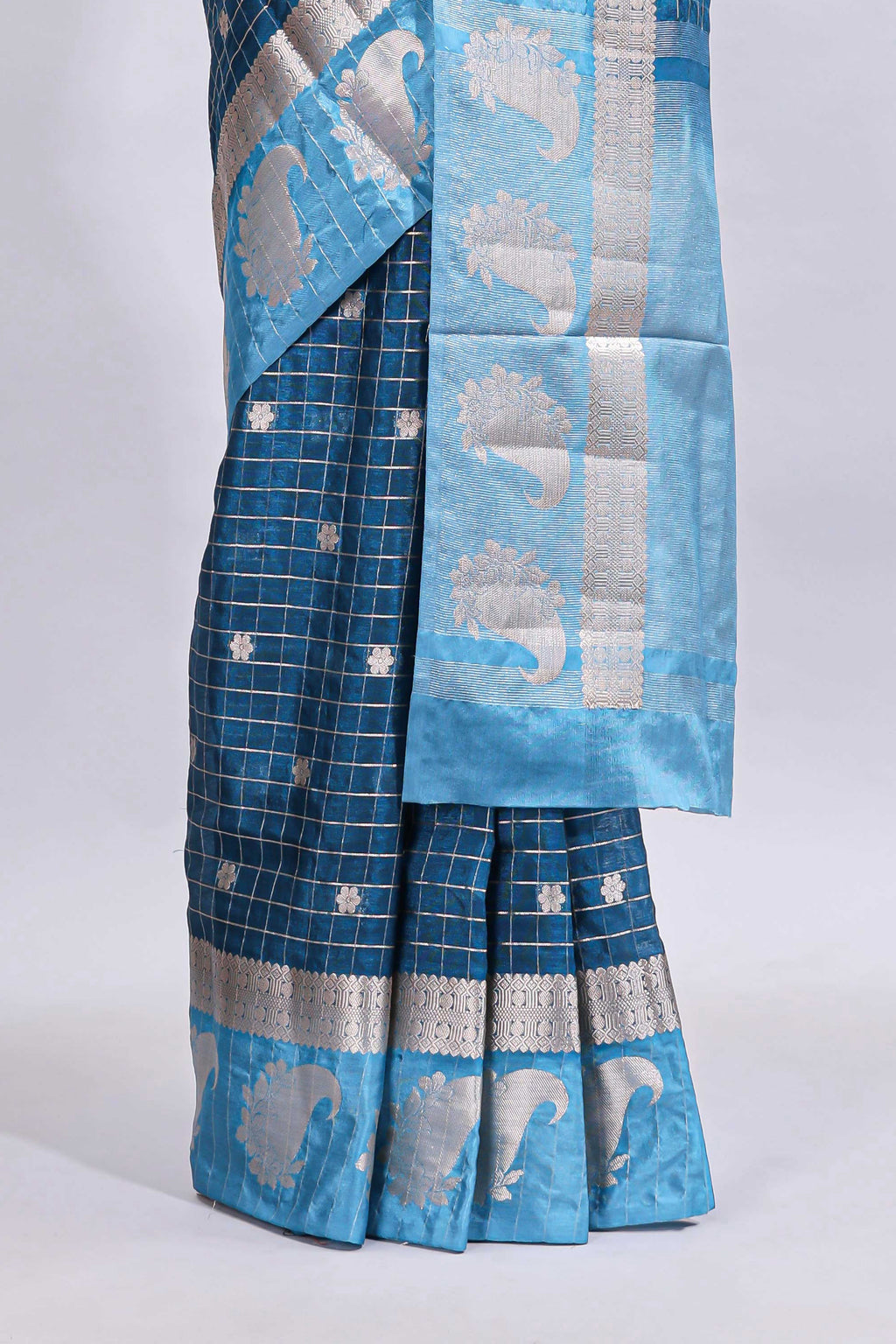 Blue checked floral motifs design mushru silk saree with contrast border and blouse