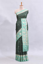 Green checked floral motifs design mushru silk saree with contrast border and blouse