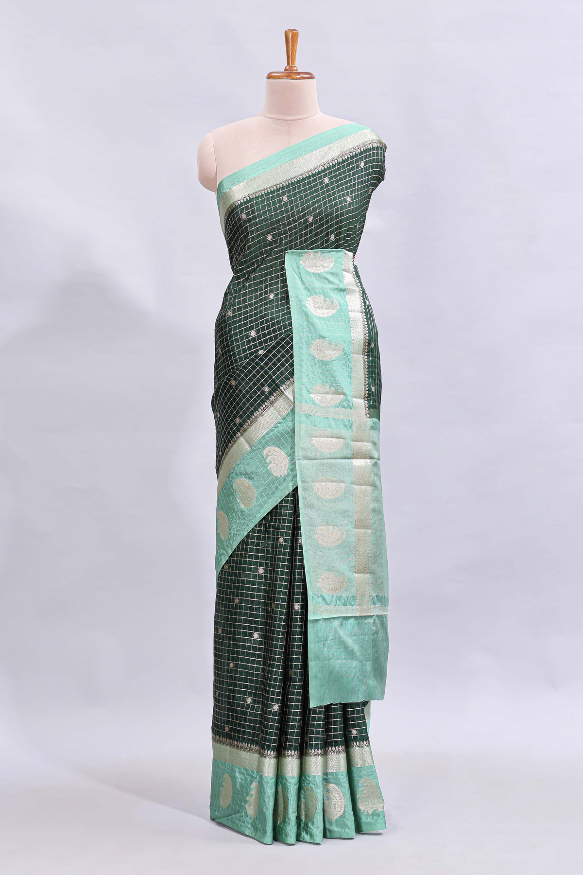 Green checked floral motifs design mushru silk saree with contrast border and blouse