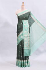 Green checked floral motifs design mushru silk saree with contrast border and blouse