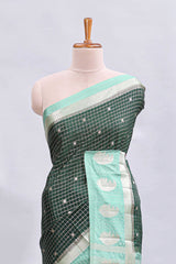 Green checked floral motifs design mushru silk saree with contrast border and blouse