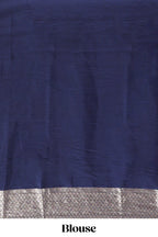 Blue zari design mushru silk saree with contrast striped zari border and blouse