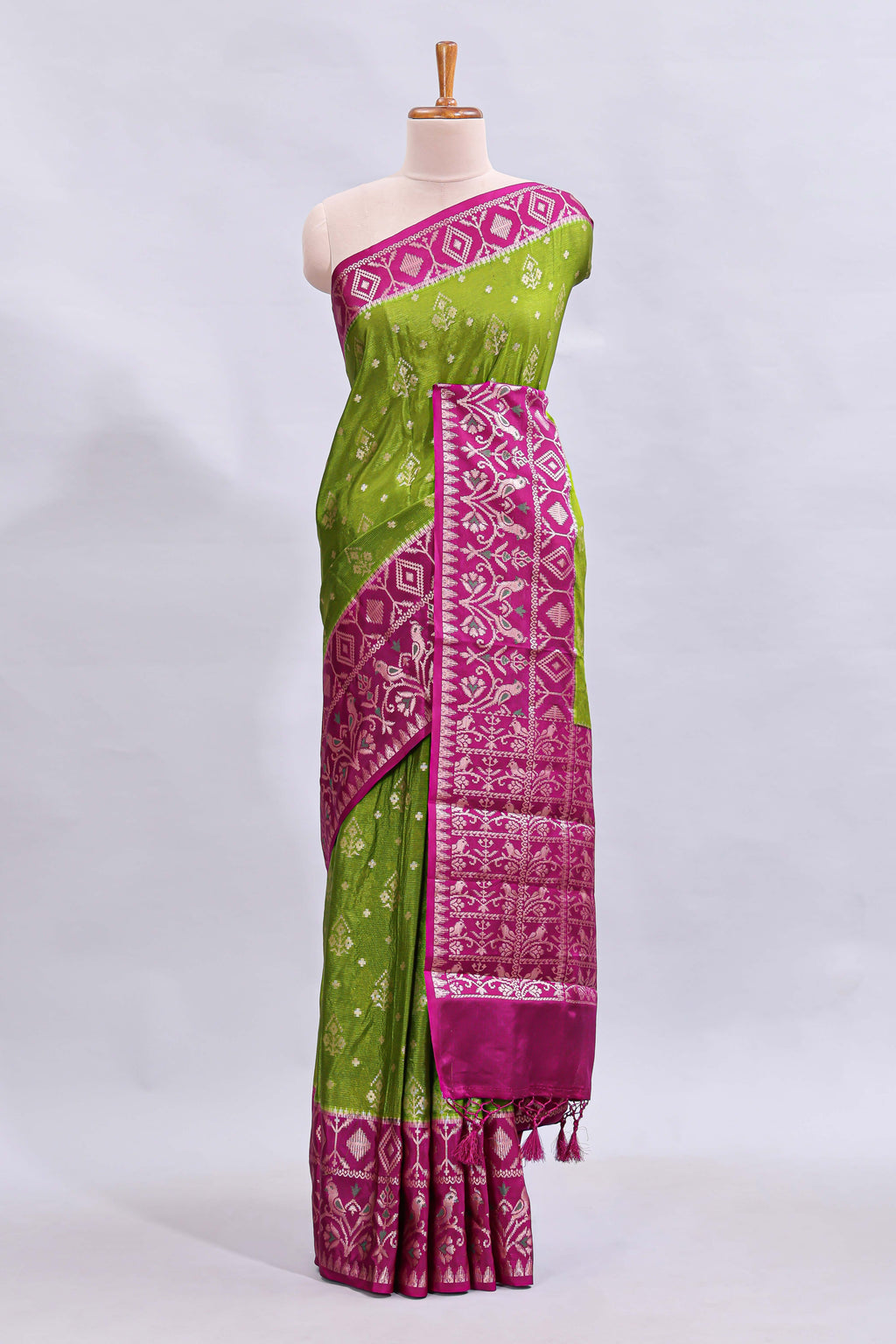 Green floral design mushru silk saree with contrast border and zari blouse