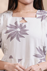 White floral printed A-line maternity wear with 3/4 sleeves and keyhole neck