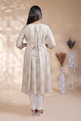Off White floral printed A-line maternity wear with 3/4 sleeves and keyhole neck