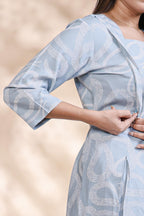 Baby blue abstract printed A-line maternity wear with 3/4 sleeves and keyhole neck