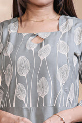 Grey floral printed A-line maternity wear with 3/4 sleeves and keyhole neck
