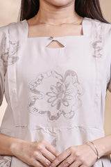 Beige floral printed A-line maternity wear with 3/4 sleeves and keyhole neck