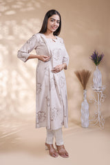 Beige floral printed A-line maternity wear with 3/4 sleeves and keyhole neck