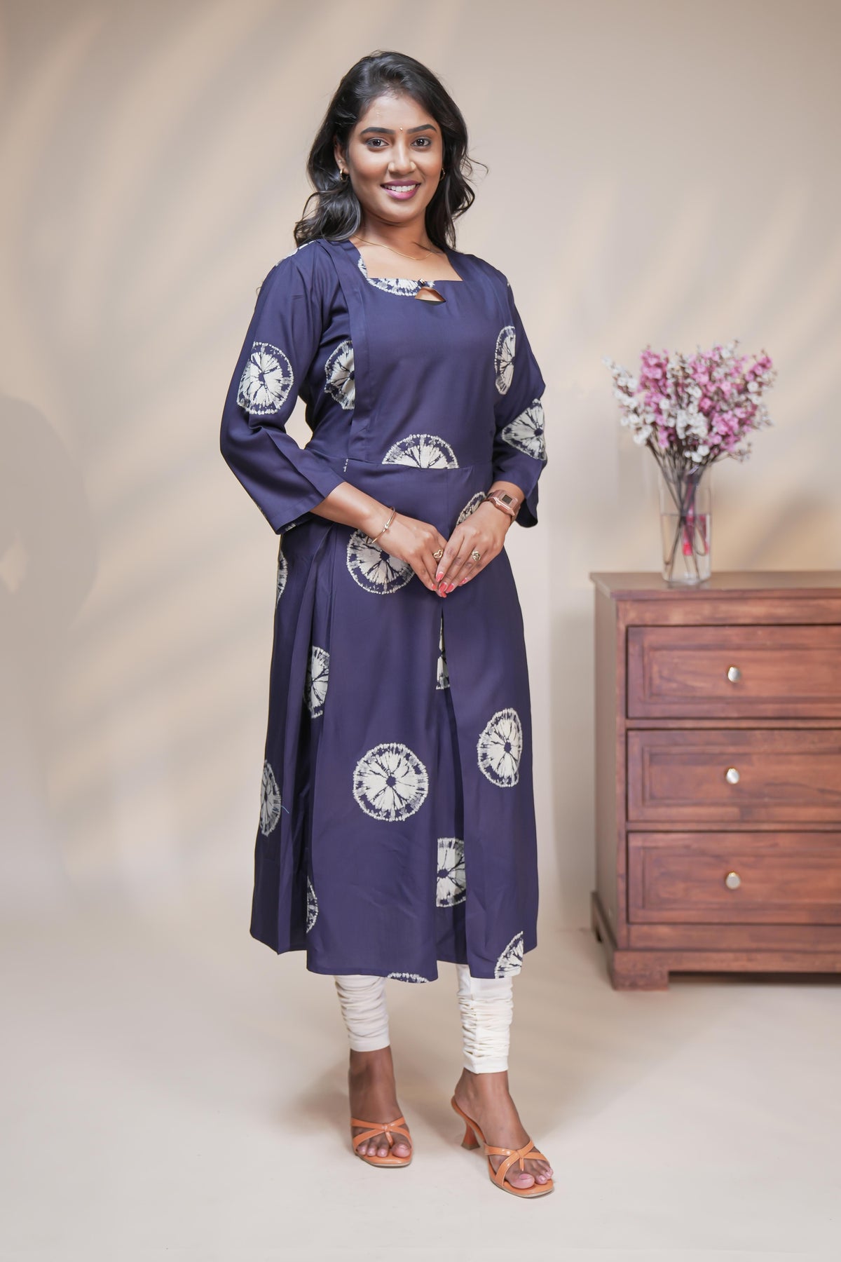 Blue circular motifs box pleat maternity wear with 3/4 sleeves and box neck