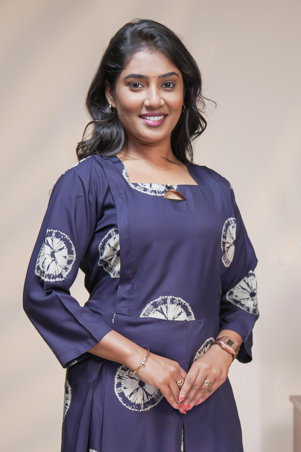 Blue circular motifs box pleat maternity wear with 3/4 sleeves and box neck
