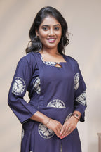 Blue circular motifs box pleat maternity wear with 3/4 sleeves and box neck