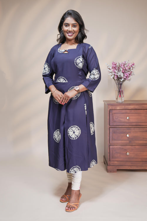 Blue circular motifs box pleat maternity wear with 3/4 sleeves and box neck