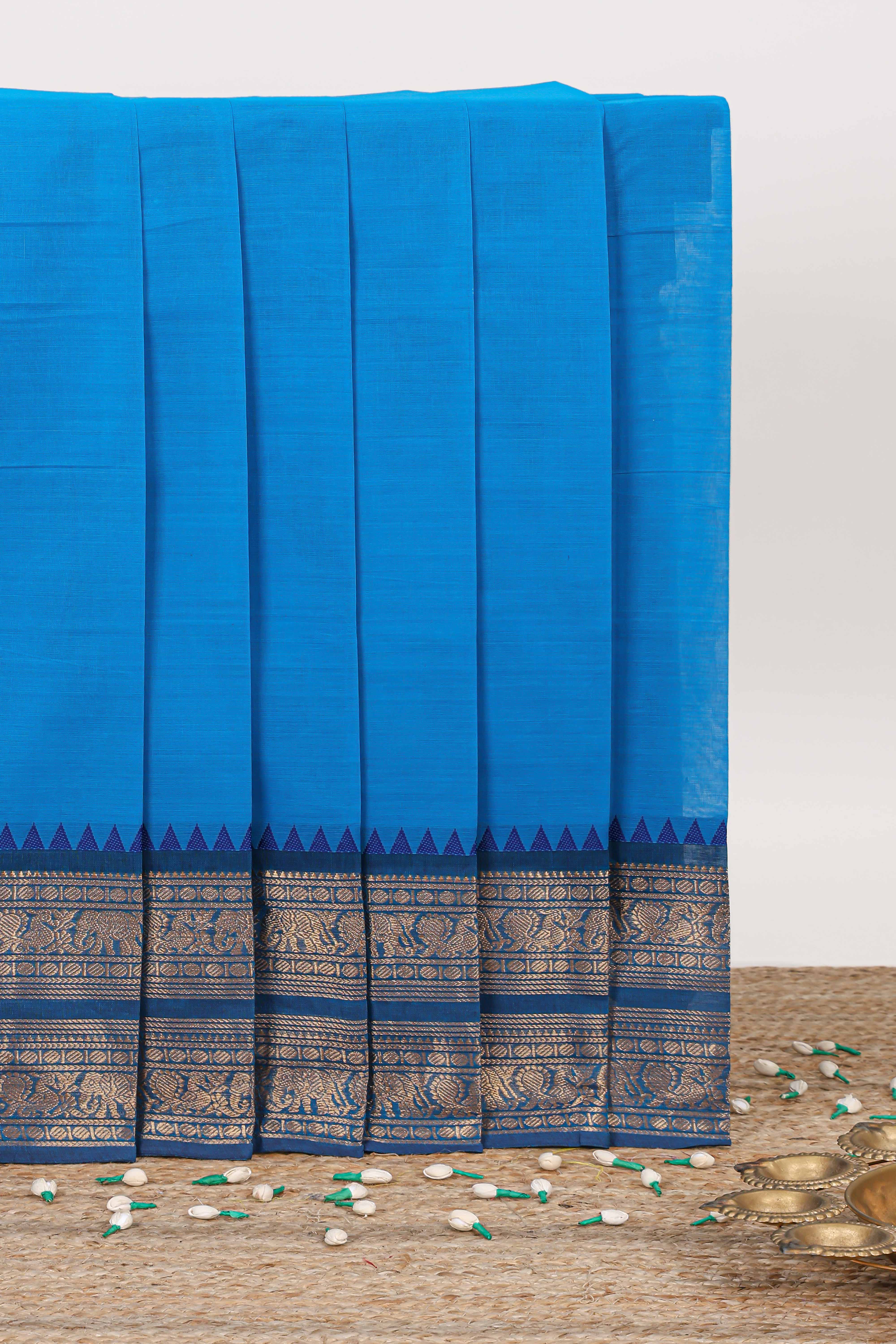 Blue plain narayanapet cotton saree with contrast zari border and stripe pallu