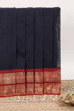 Dark blue plain narayanapet cotton saree with contrast zari border and stripe pallu