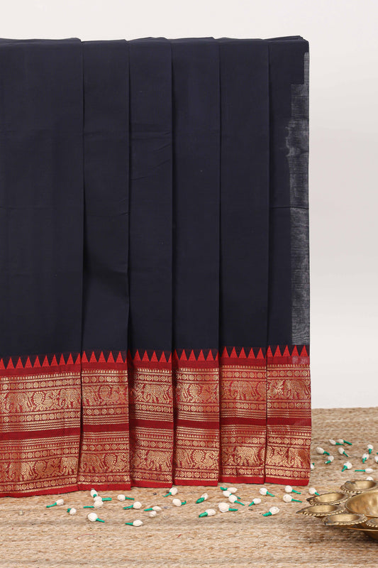 Dark blue plain narayanapet cotton saree with contrast zari border and stripe pallu