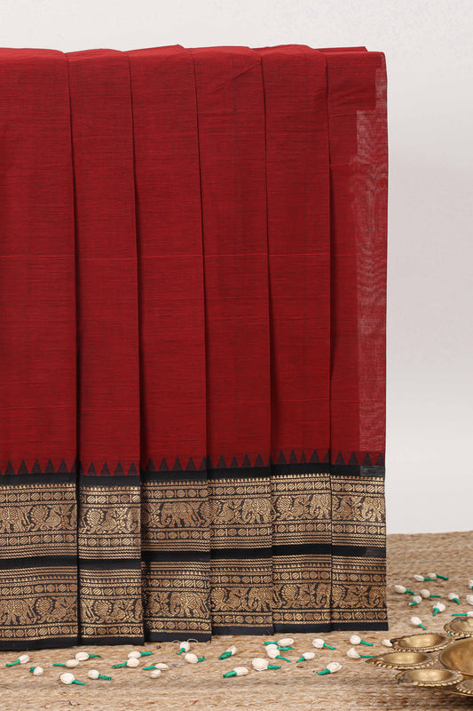 Maroon plain narayanapet cotton saree with contrast zari border and stripe pallu
