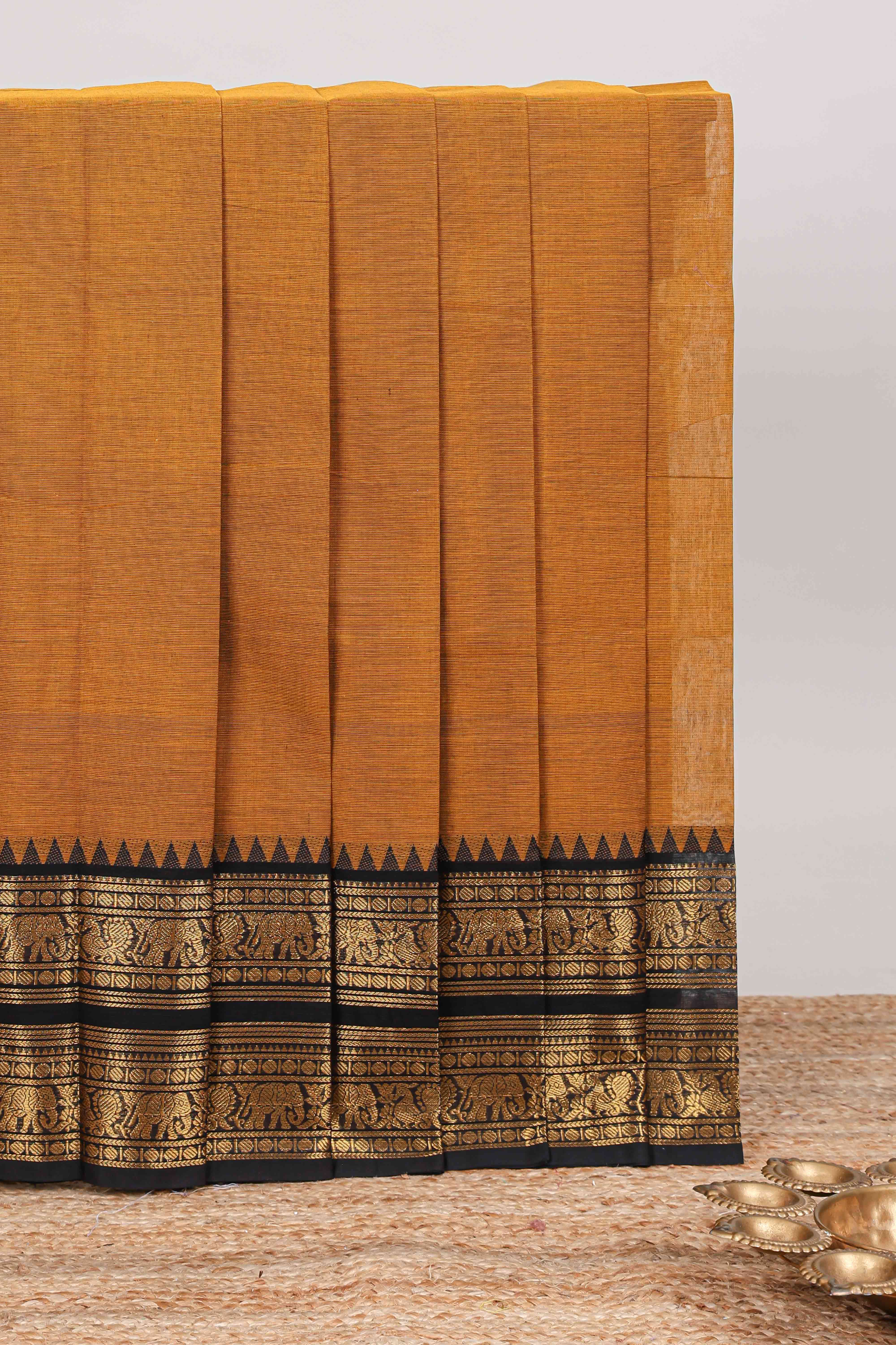 Mustard plain narayanapet cotton saree with contrast zari bendex border and stripe pallu
